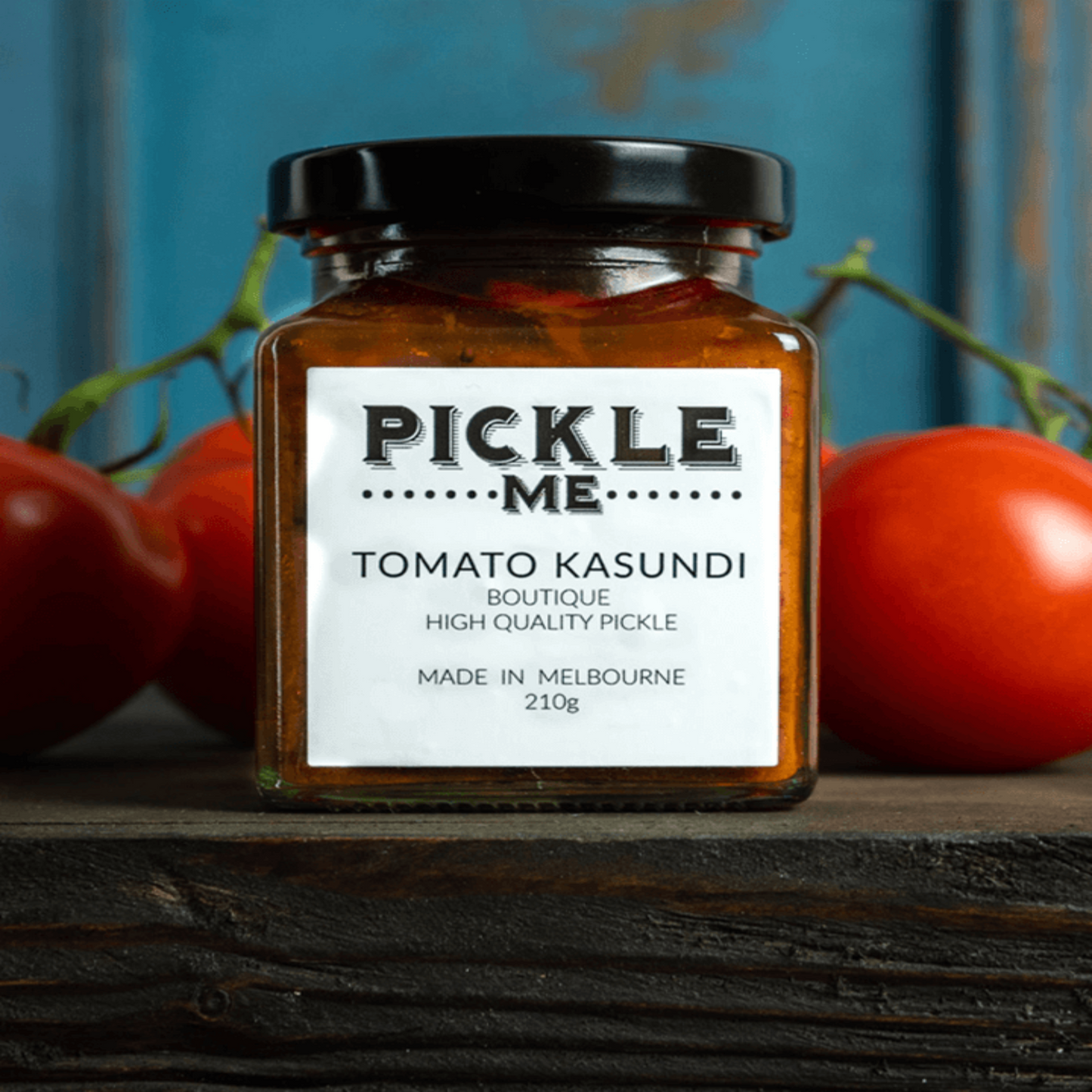 Tomato-based chilli pickle with ginger and spices, perfect for any dish.