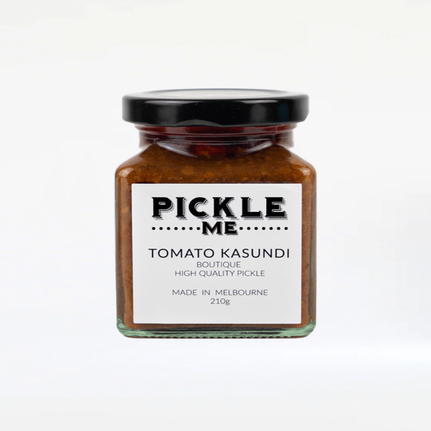 Tomato-based chilli pickle with ginger and spices, perfect for any dish.