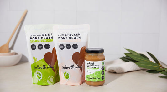 Grass-fed beef and chicken bone broth pouches and bone broth concentrate jar from The Broth Sisters