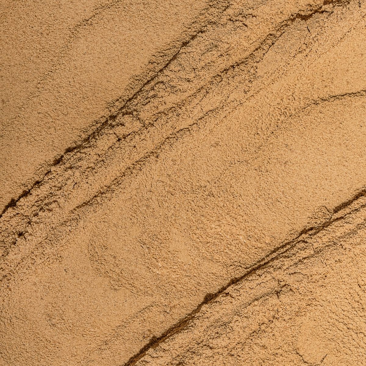 Close-up of sand with natural patterns