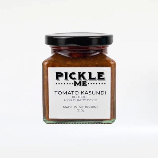 Tomato-based chilli pickle with ginger and spices, perfect for any dish.